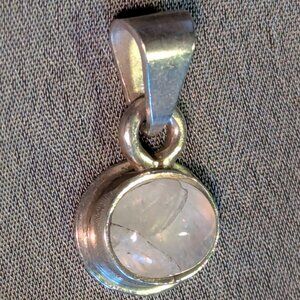 Rainbow Moonstone Pendant set in Sterling Silver oval Cabochon